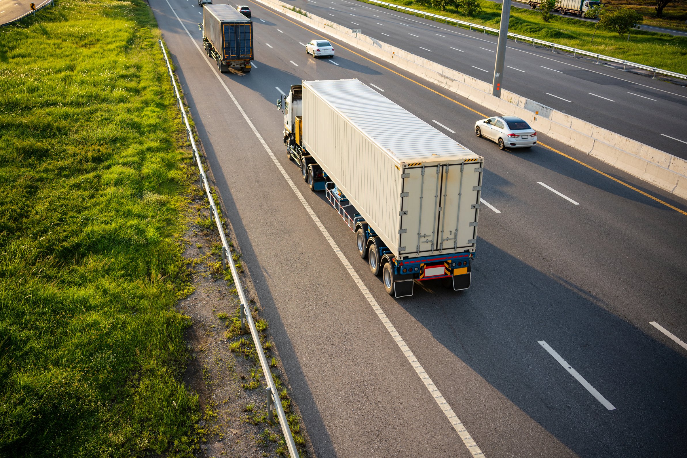 White Truck on Highway Road with Container